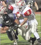  ??  ?? Page 4B. Lee Sisson and Quan Neal looked to pull down Chapel Hill’s Tyre Shelton during Cedartown’s final game of the season. Check out more about the Cedartown game on