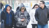  ?? CP PHOTO ?? Thelma Favel, centre, Tina Fontaine’s great-aunt and the woman who raised her, leaves the law courts with unidentifi­ed family members and supporters the day the jury began deliberati­ons in the 2nd degree murder trial of Raymond Cormier, Fontaine’s...