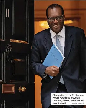  ?? AARON CHOWN ?? Chancellor of the Exchequer Kwasi Kwarteng leaves 11 Downing Street to deliver his mini-budget