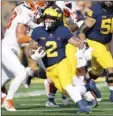  ?? AP photo ?? Michigan running back Blake Corum, injured last week against Illinois, is expected to play Saturday against Ohio State.