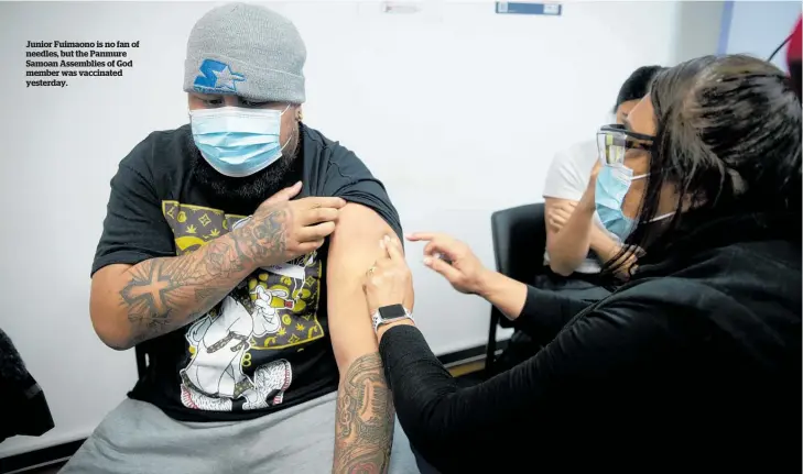  ??  ?? Junior Fuimaono is no fan of needles, but the Panmure Samoan Assemblies of God member was vaccinated yesterday.