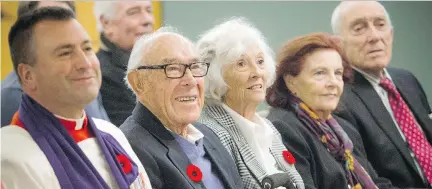  ?? ASHLEY FRASER ?? Chaplain Gen. Guy Chapdelain­e, left, joins members of the Fripp family — from left, John, Elizabeth, Patricia and Shaun — Sunday at a ceremony at Beechwood Cemetery honouring their ancestor, Maj.-Gen. Sir Edward Morrison, who was Canada’s artillery commander in the First World War.