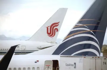  ??  ?? File photo shows the tail of the Air China Boeing 777-300ER plane, which flew Air China’s inaugural flight from Beijing to Panama City via Houston, is pictured after it landed at the Tocumen Internatio­nal airport in Panama City, Panama. — Reuters photo