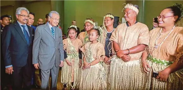  ?? PIC BY LUQMAN HAKIM ZUBIR ?? Prime Minister Tun Dr Mahathir Mohamad at the 2019 National Orang Asli Convention in Putrajaya yesterday. With him is Minister in the Prime Minister’s Department Senator P. Waytha Moorthy (left).