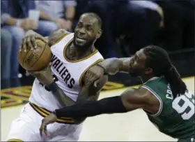  ?? TONY DEJAK — THE ASSOCIATED PRESS ?? The Cavaliers’ LeBron James goes up for a shot against Boston’s Jae Crowder during the second half of Game 4 of the Eastern Conference finals. James said his chase of Michael Jordan is a personal goal that keeps him motivated.