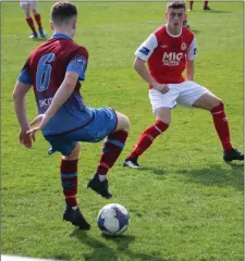  ??  ?? Drogheda United’s Aaron Smith takes the attack to St Pats at United Park on Saturday.