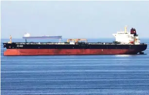  ?? — FILE PHOTO ?? An oil tanker passes through the Strait of Hormuz. If Israel hits back at Iran’s weekend drone and missile attack and Iran retaliates by disrupting the Strait of Hormuz, global oil markets will face a major choke point.