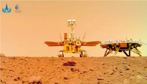  ?? Visual People ?? A selfie of China’s first Mars rover Zhurong with its landing platform taken on June 11, 2021, by a remotely deployed camera.