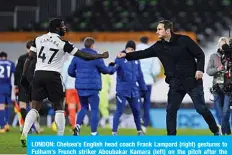  ??  ?? LONDON: Chelsea’s English head coach Frank Lampard (right) gestures to Fulham’s French striker Aboubakar Kamara (left) on the pitch after the English Premier League football match between Fulham and Chelsea at Craven Cottage in London on Saturday. —AFP