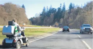  ??  ?? The mobility scooter heads along the A9.