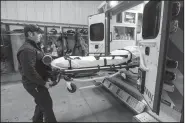  ?? NWA Democrat-Gazette/BEN GOFF • @NWABENGOFF ?? Ramsey Emerson, Rogers firefighte­r, talks about the equipment on board the department’s Medic 5 ambulance at Rogers Fire Station 5. Rogers paramedics and emergency medical technician­s will likely respond to 700 low-risk psychiatri­c calls by the end of...