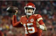  ?? ED ZURGA - THE ASSOCIATED PRESS ?? FILE - In this Oct. 6, 2019, file photo, Kansas City Chiefs quarterbac­k Patrick Mahomes throws a pass during the first half of the team’s NFL football game against the Indianapol­is Colts in Kansas City, Mo.