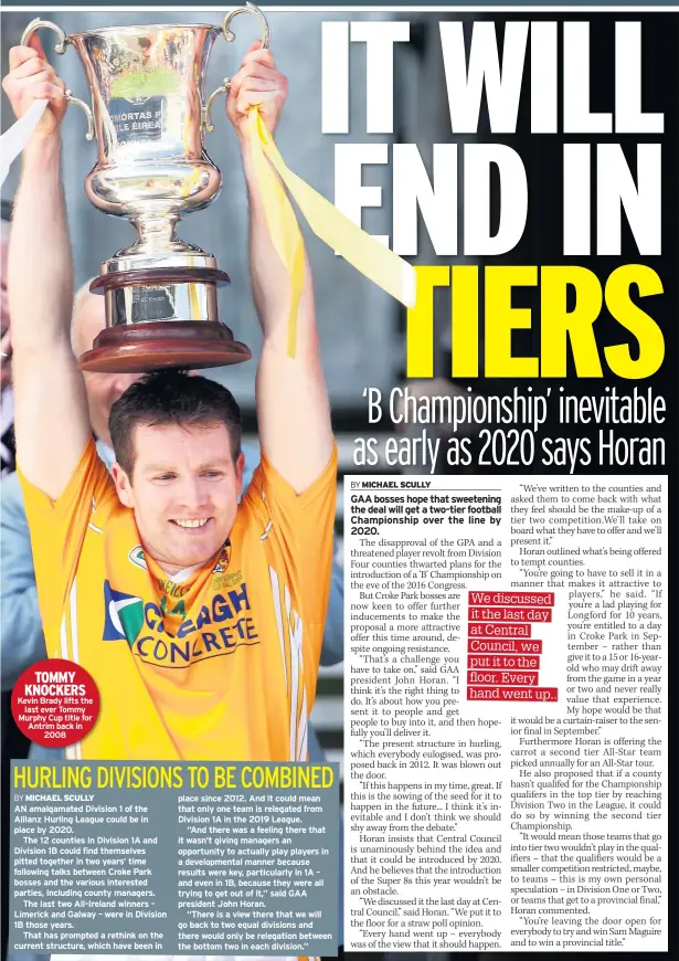  ??  ?? TOMMY KNOCKERS Kevin Brady lifts the last ever Tommy Murphy Cup title for Antrim back in 2008