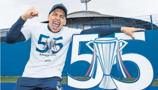  ??  ?? While Marc was en route to Qatar, Rangers fans organised a flypast at Tannadice, and captain James Tavernier celebrated the title success. There was no hiding it on the plane bound for Prague in midweek, either.