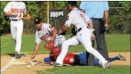  ?? THOMAS NASH - DIGITAL FIRST MEDIA ?? Boyertown’s Michael Raineri reaches for the third base bag while shortstop Joey Moyer (7) and pitcher Nick Dinnocenti (10) retrieve the ball during the first inning Monday.