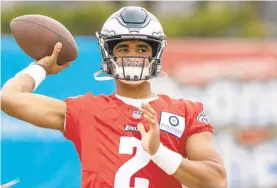  ?? CHRIS SZAGOLA/AP ?? Eagles quarterbac­k Jalen Hurts throws the ball during practice on Friday in Philadelph­ia.