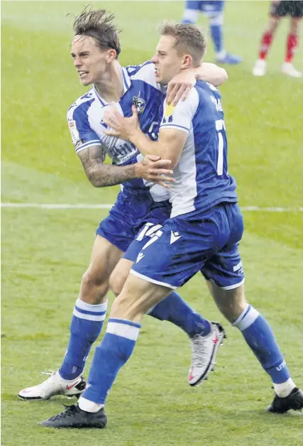  ?? Picture: Matt Bunn ?? Bristol Rovers’ James Daly, right, celebrates his goal against Lincoln
