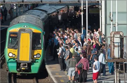  ??  ?? BLIGHTED: Passengers on Southern were hit by strikes again last week but will soon be able to claim full cash refunds