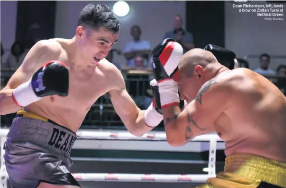  ?? Philip Sharkey ?? Dean Richardson, left, lands a blow on Zoltan Turai at Bethnal Green