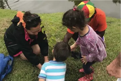  ?? Photo: Lusiana Tuimaisala ?? Glenis Yee supporting the initiative with her two kids planting a tree at My Suva Picnic Park on July 29, 2017.