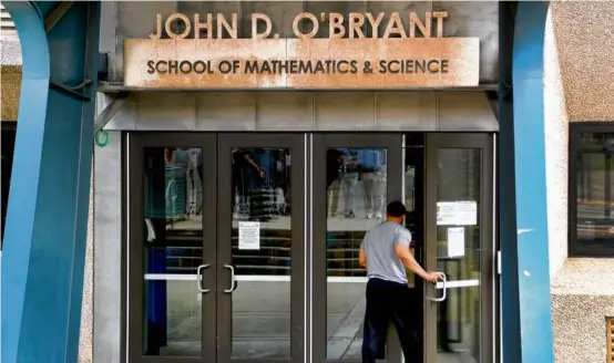  ?? JOHN TLUMACKI/GLOBE STAFF ?? The plan to move the John D. O’Bryant Math + Science High School has received significan­t opposition from the community.