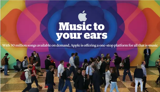  ?? AFP ?? People gather during Apple WWDC in San Francisco. Apple annouced a new OS X, El Capitan, iOS 9 and Apple Music during the keynote at the annual developers conference that ran through Friday. —