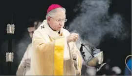  ??  ?? ARCHBISHOP JOSÉ H. GOMEZ urged worshipper­s to pray for immigratio­n reform and for others to open their hearts to immigrants, who “suffer,” he said.