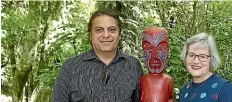  ??  ?? Rangita¯ ne carver Craig Kawana, left, and Conservati­on Minister Eugiene Sage with the sculpture that was vandalised.