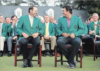  ?? GETTY IMAGES FILE PHOTO ?? Patrick Reed, right, reacts with Sergio Garcia after being presented with the green jacket in honour of winning the 2018 Masters at Augusta National Golf Club on April 8 in Augusta, Ga.