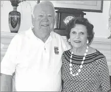  ?? DOUG GORMAN / Newnan-Times Herald ?? Calhoun High grad Kenneth Moore (left), seen here with his wife Marcia, will be inducted into the Calhoun-Gordon County Sports Hall of Fame on Aug. 13.
