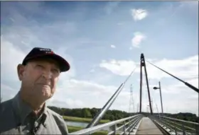  ?? VIRGINIA MAYO — THE ASSOCIATED PRESS FILE ?? George Barkhouse, 84, from Nova Scotia, Canada, looks out to where his uncle, World War I soldier Pvt. George Lawrence Price, was killed in Ville-sur-Haine, Belgium on just two minutes before the Armistice. He is known as the last Canadian soldier to die on the Western Front in the First World War.