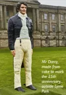  ??  ?? Mr Darcy, made from cake to mark the 25th anniversar­y, outside Lyme Park