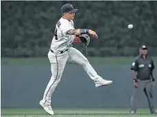  ?? /GETTY IMAGES. ?? El infielder puertorriq­ueño no puede utilizar su brazo y por ello causará baja con su selección.