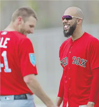  ?? STAFF PHOTO BY MATT STONE ?? FUNNY BUSINESS: David Price jokes around with Chris Sale during a workout in Fort Myers.