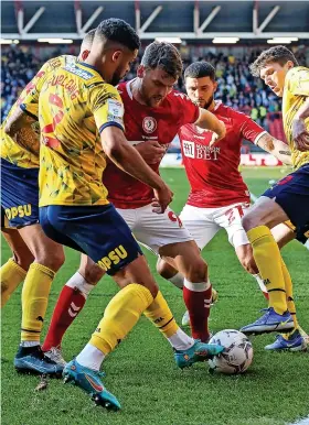  ?? ?? City striker Chris Martin finds himself surrounded by West Brom players