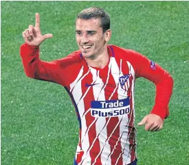  ??  ?? Atletico Madrid’s Antoine Griezmann celebrates after scoring a goal.