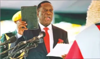  ??  ?? Cde Emmerson Mnangagwa takes his Oath of Office as Zimbabwe’s second Executive President before Chief Justice Luke Malaba last Friday