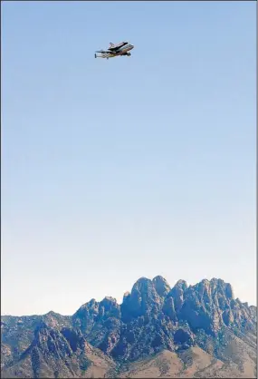  ?? JIM THOMPSON/JOURNAL ?? The space shuttle Endeavour passes over the Organ Mountains in southern New Mexico on Thursday.