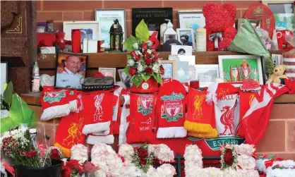  ??  ?? Flowers and tributes at the Hillsborou­gh memorial at Liverpool’s Anfield stadium on Wednesday after the trial collapsed. Photograph: Peter Byrne/PA