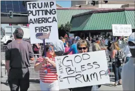  ??  ?? A group of supporters of President Donald Trump gathers to show their appreciati­on for him Wednesday outside the Reno-sparks Convention Center in Reno, where Trump spoke during the American Legion’s national convention.