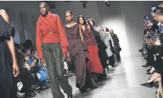  ?? ?? Models present creations by Traore for the Women Ready-to-wear Fall-Winter 2024/2025 collection.