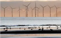  ?? Photo / AP ?? The report says it would require a big boost in wind and solar power use for government­s to meet the goals of the 2015 climate accord.