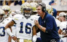  ?? DAVID GOLDMAN / AP ?? The Military Bowl in Annapolis, Md., would be a fitting game for coach Paul Johnson, who formerly coached Navy.