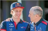  ?? GETTY IMAGES ?? Brendon Hartley, left, with Toro Rosso boss Franz Tost.