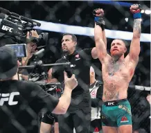  ?? STEVE MARCUS/GETTY IMAGES ?? Conor McGregor celebrates after defeating Nate Diaz in a majority decision Saturday night in Las Vegas.