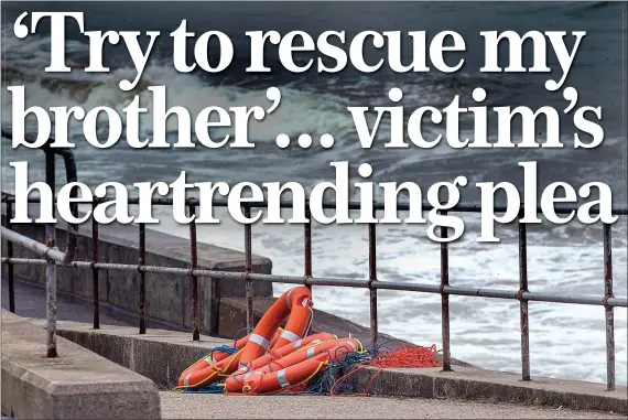  ??  ?? BEACH HORROR: Lifebelts lie at the spot where the mother and son were swept away