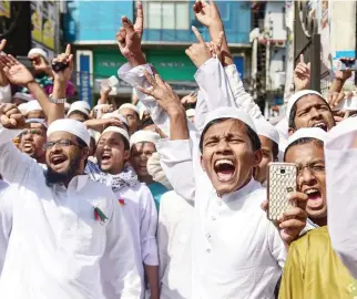  ??  ?? Activists from a Bangladesh Islamist group shout slogans as they take part in a protest calling for a statue referred to as a ‘Greek goddess’ installed at the Supreme Court to be destroyed or removed in Dhaka in this February file photo. (AFP)