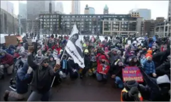  ?? DAVID JOLES/STAR TRIBUNE VIA AP ?? Hundreds of protesters take a knee outside U.S. Bank Stadium, outside the Super Bowl as an Anti-Racist Anti-Corporate rally joined with Take a Knee Nation, Sunday, Feb. 4, 2018, in Minneapoli­s, Minn.