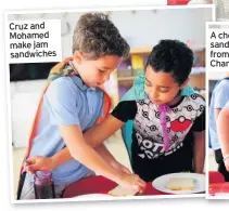  ??  ?? Cruz and Mohamed make jam sandwiches