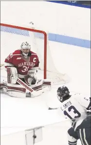  ?? Steven Musco / Yale Athletics ?? Second-period action from Saturday's men's hockey game between Yale and Harvard at Ingalls Rink.